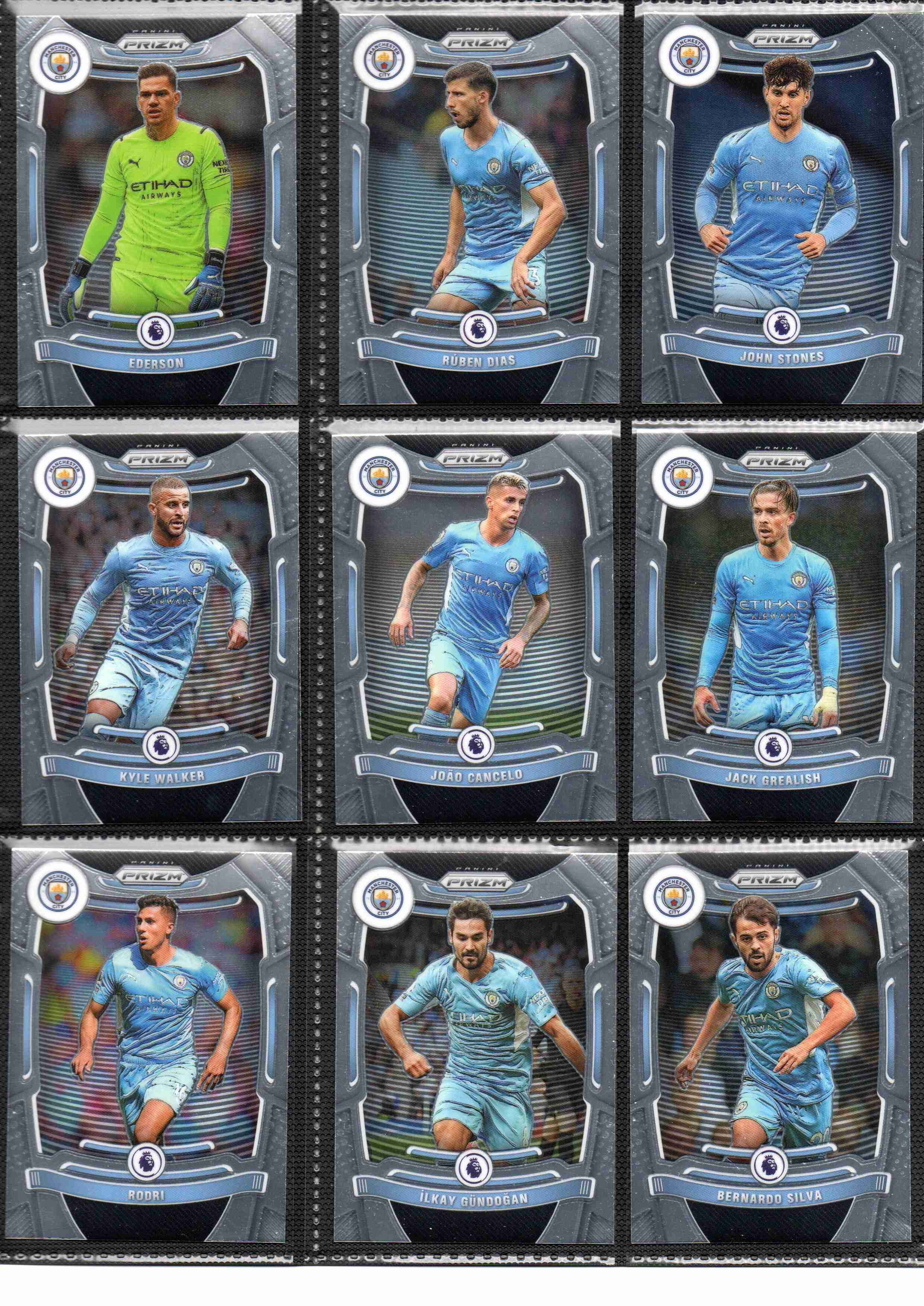 Manchester City 2021-22 Panini Prizm Premier League team set page 1 showing card fronts
